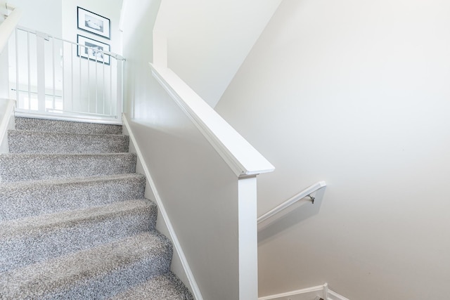 2551 Bella Dr, Pingree Grove, IL 60140 - staircase featuring baseboards