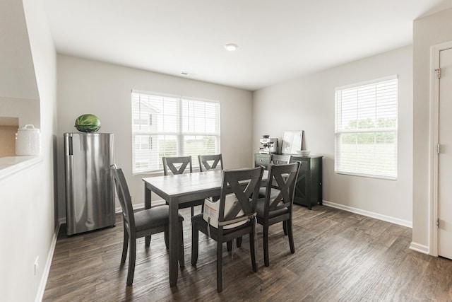 2551 Bella Dr, Pingree Grove, IL 60140 - dining space with healthy amount of natural light and dark wood finished floors