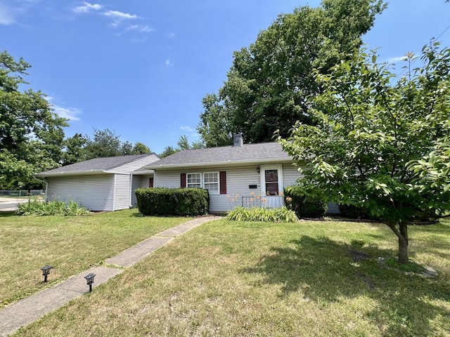 302 Kelly Ct, Champaign, IL 61821 - view of front of property with a front lawn