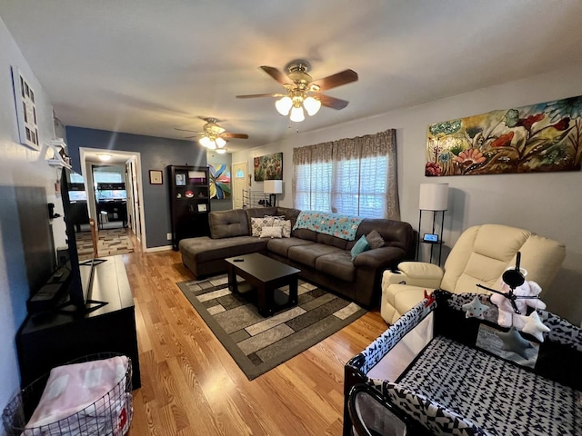 302 Kelly Ct, Champaign, IL 61821 - living room featuring light wood-style flooring and ceiling fan