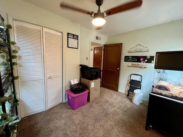 302 Kelly Ct, Champaign, IL 61821 - carpeted bedroom with a closet and ceiling fan