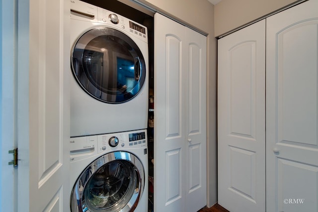 1869 Pebble Beach Cir Unit A, Elk Grove Village, IL 60007 - laundry room featuring stacked washer and clothes dryer