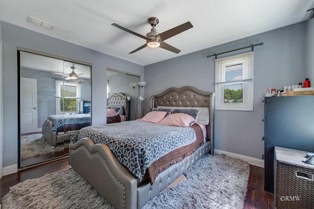 1869 Pebble Beach Cir Unit A, Elk Grove Village, IL 60007 - bedroom featuring multiple closets, wood finished floors, and ceiling fan