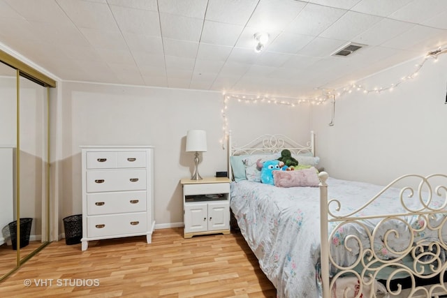 147 S Prospect St, Wheaton, IL 60187 - bedroom featuring light wood-type flooring and a closet