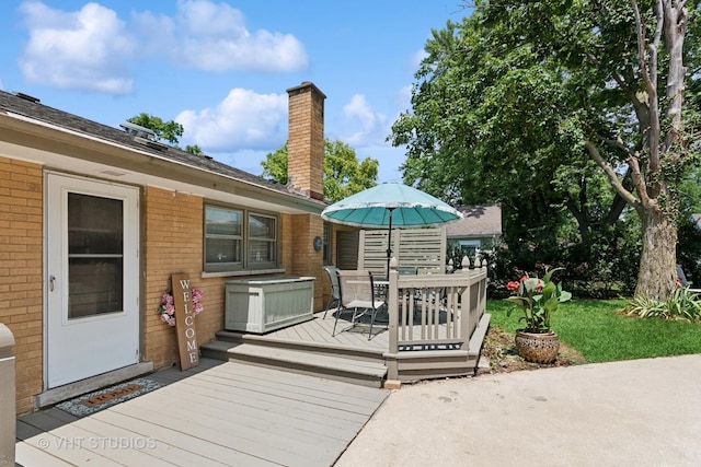 147 S Prospect St, Wheaton, IL 60187 - wooden deck featuring outdoor dining area and a yard