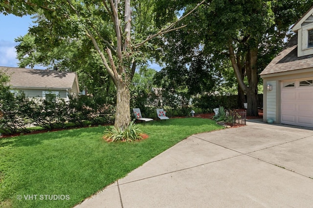 147 S Prospect St, Wheaton, IL 60187 - view of green lawn featuring driveway and a garage