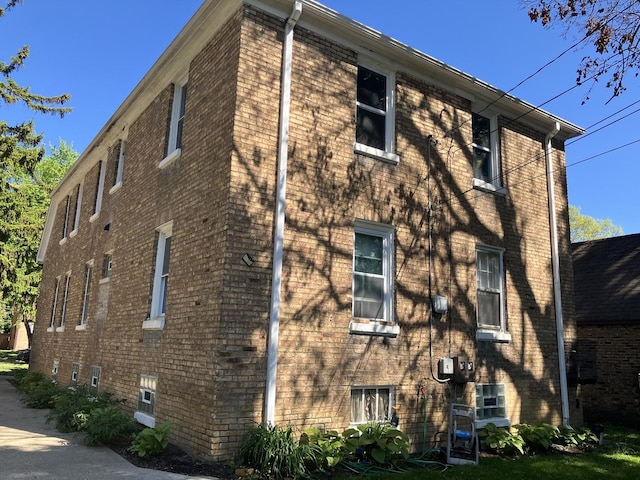 1334 Chestnut St, Waukegan, IL 60085 - view of home's exterior featuring brick siding