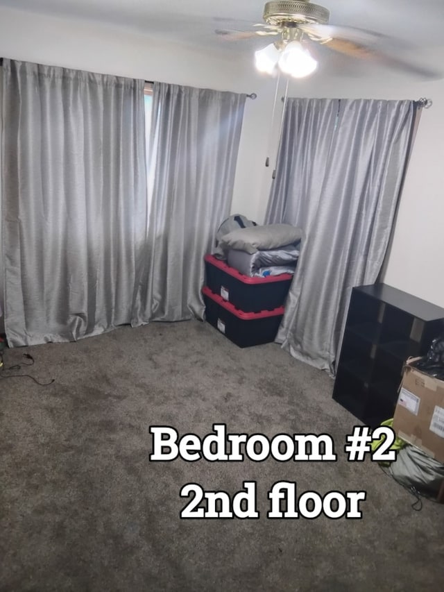 100 Prince Ct, Poplar Grove, IL 61065 - carpeted bedroom featuring a ceiling fan