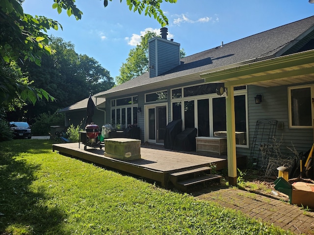 100 Prince Ct, Poplar Grove, IL 61065 - back of property featuring a deck, a chimney, a yard, and a shingled roof