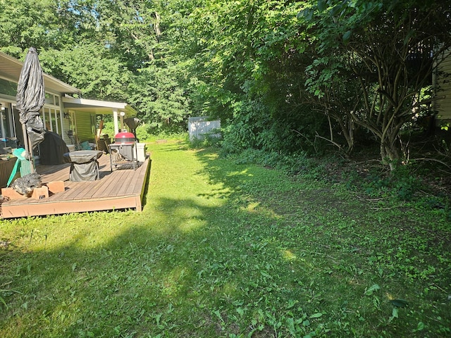 100 Prince Ct, Poplar Grove, IL 61065 - view of grassy yard featuring a deck