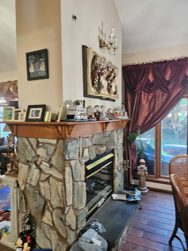 100 Prince Ct, Poplar Grove, IL 61065 - living area featuring a fireplace, wood-type flooring, and plenty of natural light
