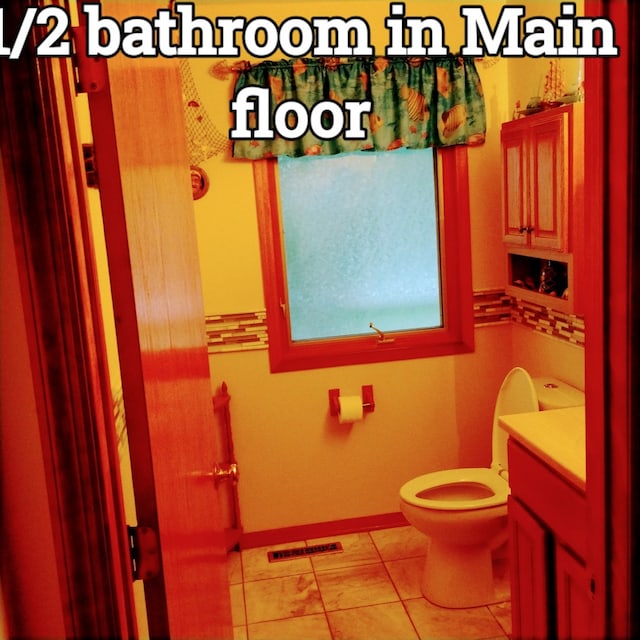 100 Prince Ct, Poplar Grove, IL 61065 - half bathroom featuring toilet and vanity