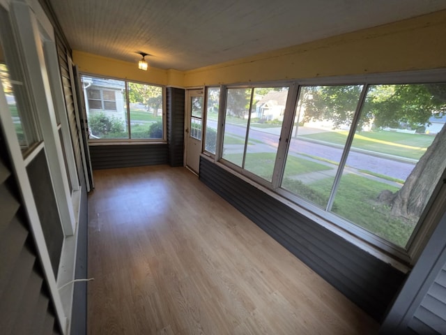 2117 11th St, Peru, IL 61354 - unfurnished sunroom featuring wood finished floors