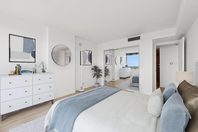 7234 W N Ave Unit 1610, Elmwood Park, IL 60707 - bedroom featuring light wood-style floors and a closet