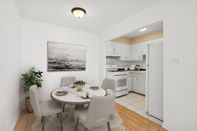 7234 W N Ave Unit 1610, Elmwood Park, IL 60707 - dining space with light wood-type flooring and baseboards