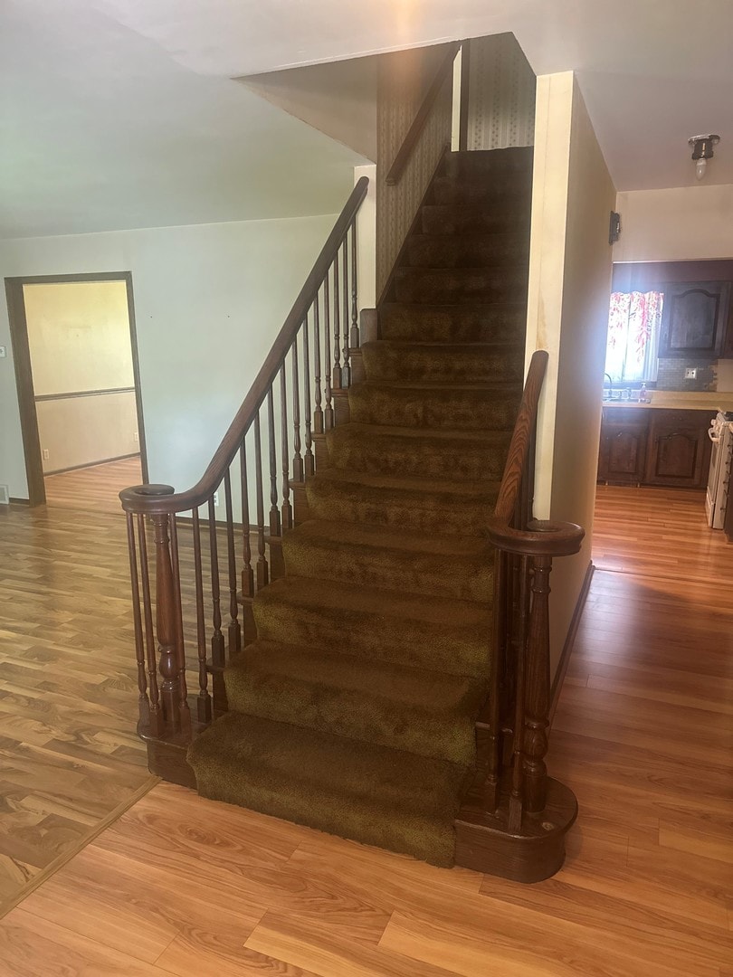 154 Howard Ave, East Dundee, IL 60118 - stairway featuring wood finished floors