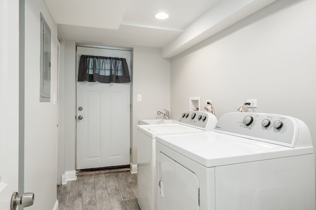 5641 W Carmen Ave, Chicago, IL 60630 - laundry room with separate washer and dryer, light wood-style floors, recessed lighting, and electric panel