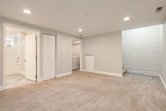 5641 W Carmen Ave, Chicago, IL 60630 - finished below grade area with washer / dryer, carpet floors, and recessed lighting