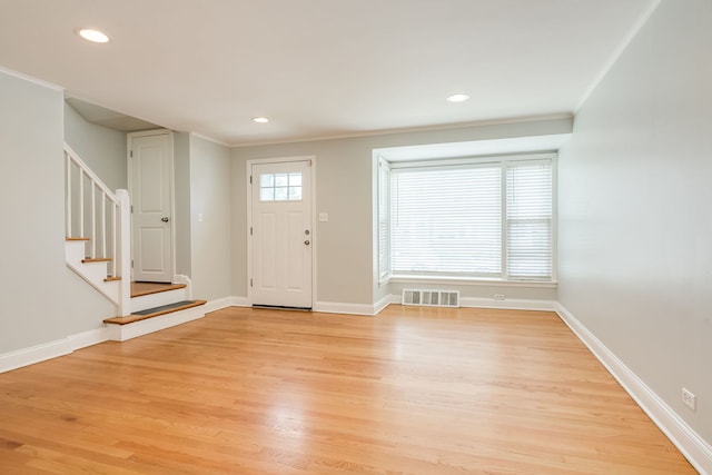 5641 W Carmen Ave, Chicago, IL 60630 - entrance foyer with ornamental molding, stairs, light wood finished floors, and recessed lighting