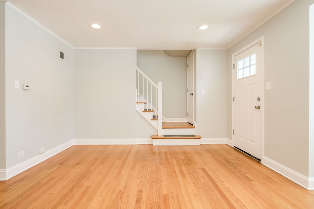 5641 W Carmen Ave, Chicago, IL 60630 - foyer entrance with ornamental molding, stairway, light wood-style floors, and recessed lighting