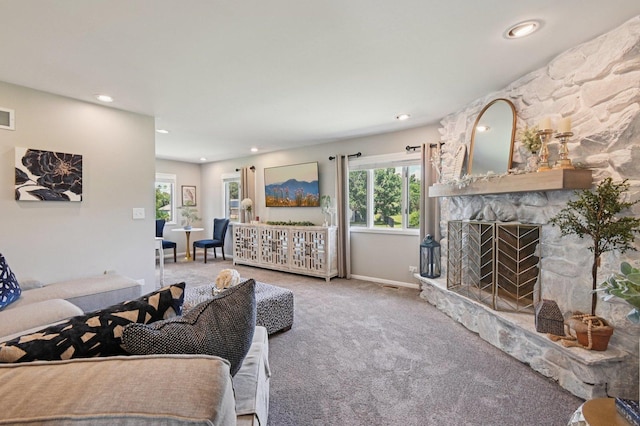 2720 Hobson Rd, Woodridge, IL 60517 - carpeted living room featuring plenty of natural light, recessed lighting, and a stone fireplace