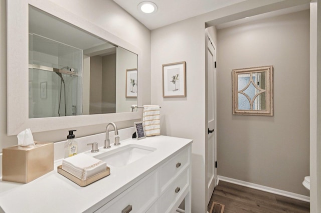 2720 Hobson Rd, Woodridge, IL 60517 - bathroom featuring vanity, wood finished floors, and a shower stall