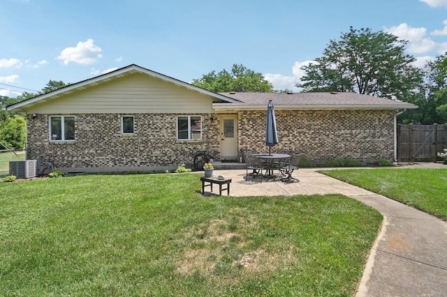 2720 Hobson Rd, Woodridge, IL 60517 - back of property with brick siding and a patio
