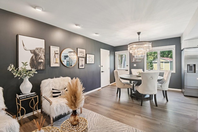 2720 Hobson Rd, Woodridge, IL 60517 - dining area featuring wood finished floors and a chandelier
