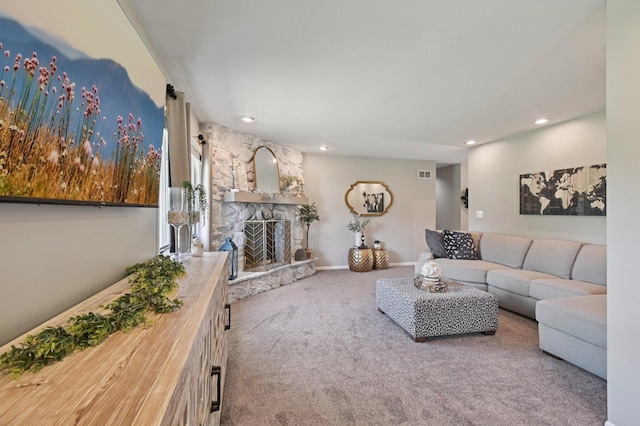 2720 Hobson Rd, Woodridge, IL 60517 - living room featuring carpet, a stone fireplace, and recessed lighting