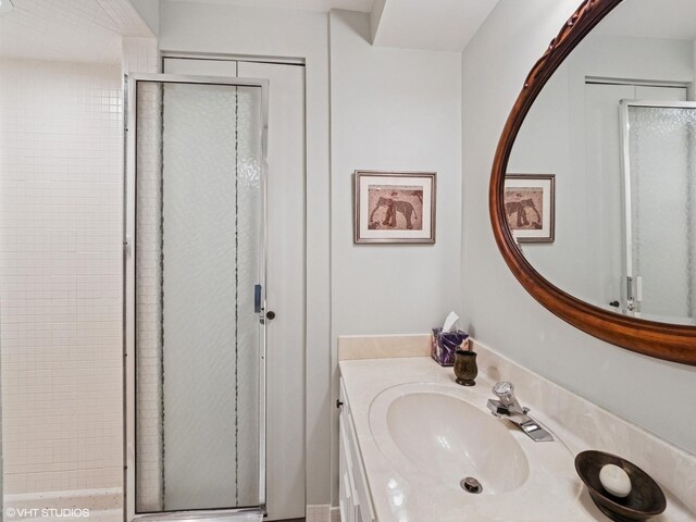 1671 Mission Hills Rd Unit 308, Northbrook, IL 60062 - bathroom featuring a stall shower and vanity