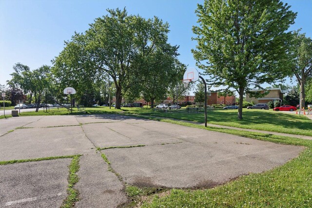 8666 Gregory Ln Unit C, Des Plaines, IL 60016 - view of basketball court featuring community basketball court and a yard