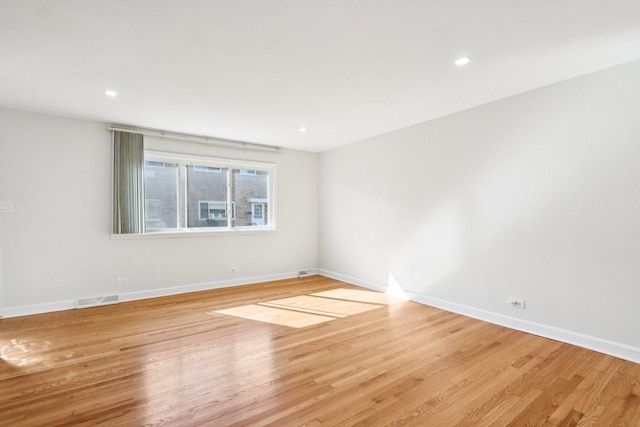 8666 Gregory Ln Unit C, Des Plaines, IL 60016 - empty room with light wood-type flooring and recessed lighting