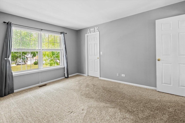 33 Sarah Dr, Crystal Lake, IL 60014 - carpeted spare room with baseboards