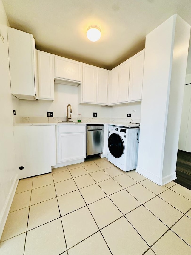 345 E Eastgate Pl Unit 602, Chicago, IL 60616 - laundry room featuring washer / clothes dryer and light tile patterned floors