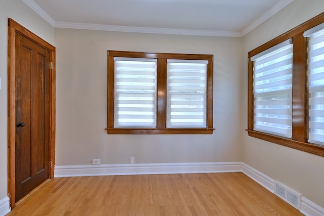 3218 Scoville Ave, Berwyn, IL 60402 - unfurnished room featuring light wood-style flooring and ornamental molding