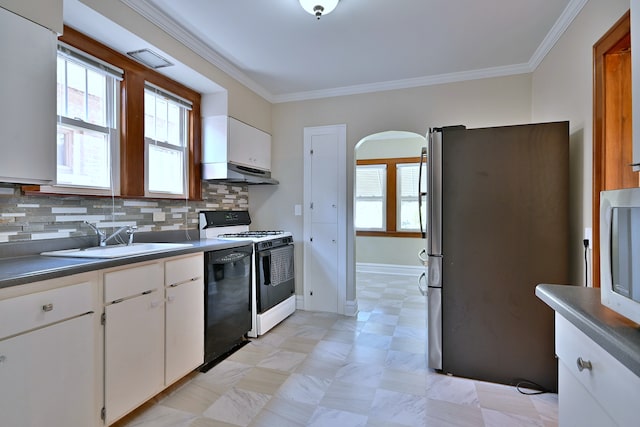 3218 Scoville Ave, Berwyn, IL 60402 - kitchen with appliances with stainless steel finishes, arched walkways, under cabinet range hood, ornamental molding, and plenty of natural light