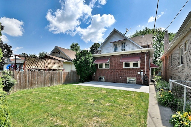 3218 Scoville Ave, Berwyn, IL 60402 - rear view of property featuring brick siding, a patio, and a fenced backyard