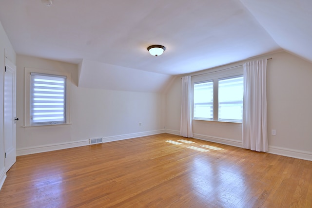 3218 Scoville Ave, Berwyn, IL 60402 - bonus room with vaulted ceiling, plenty of natural light, and light wood-style floors