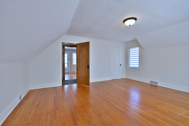 3218 Scoville Ave, Berwyn, IL 60402 - bonus room with vaulted ceiling, light wood-type flooring, and healthy amount of natural light