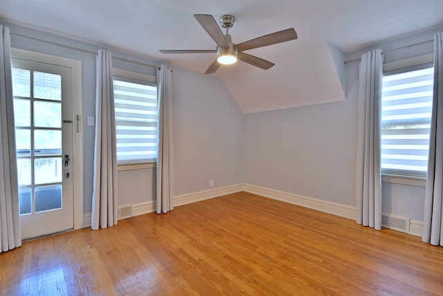 3218 Scoville Ave, Berwyn, IL 60402 - additional living space with plenty of natural light, light wood finished floors, ceiling fan, and lofted ceiling