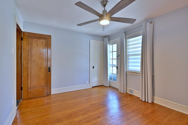 3218 Scoville Ave, Berwyn, IL 60402 - spare room featuring light wood-style flooring and ceiling fan