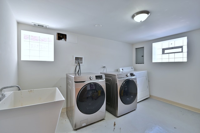 3218 Scoville Ave, Berwyn, IL 60402 - laundry room with washer and dryer, electric panel, and healthy amount of natural light