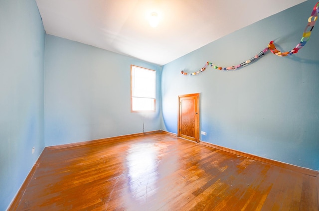 4048 N Marmora Ave, Chicago, IL 60630 - spare room with wood finished floors