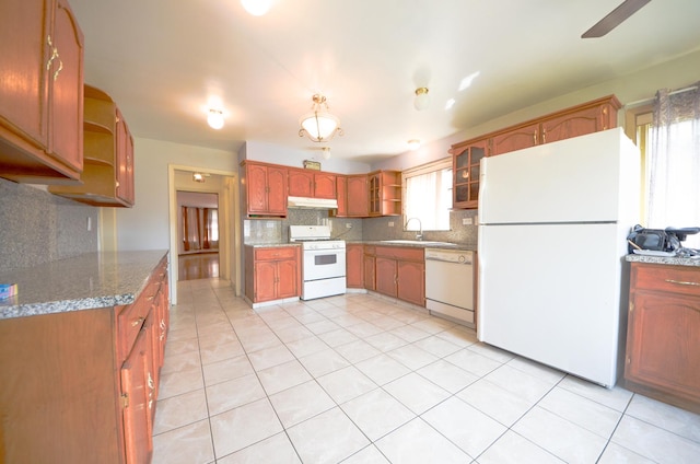 4048 N Marmora Ave, Chicago, IL 60630 - kitchen with white appliances, open shelves, backsplash, and under cabinet range hood