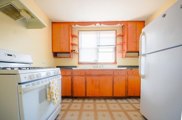 4048 N Marmora Ave, Chicago, IL 60630 - kitchen featuring white appliances, open shelves, ventilation hood, and light flooring