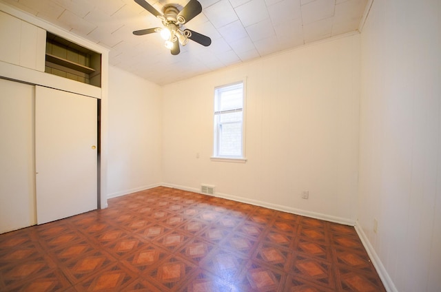 4048 N Marmora Ave, Chicago, IL 60630 - unfurnished bedroom with ceiling fan and a closet