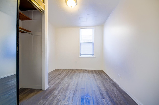 4048 N Marmora Ave, Chicago, IL 60630 - unfurnished bedroom featuring dark wood-style floors and a closet