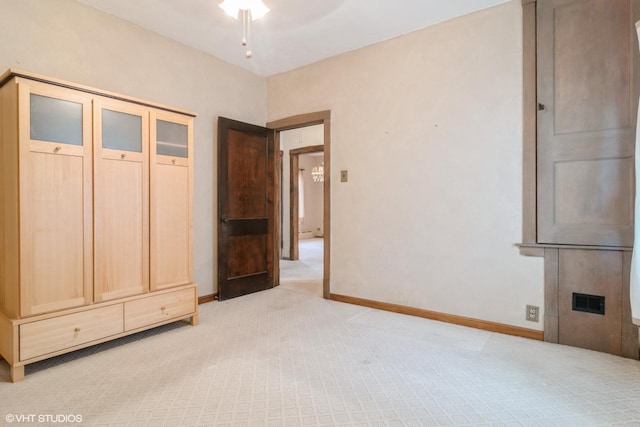 6919 N Overhill Ave, Chicago, IL 60631 - unfurnished bedroom featuring light colored carpet and baseboards