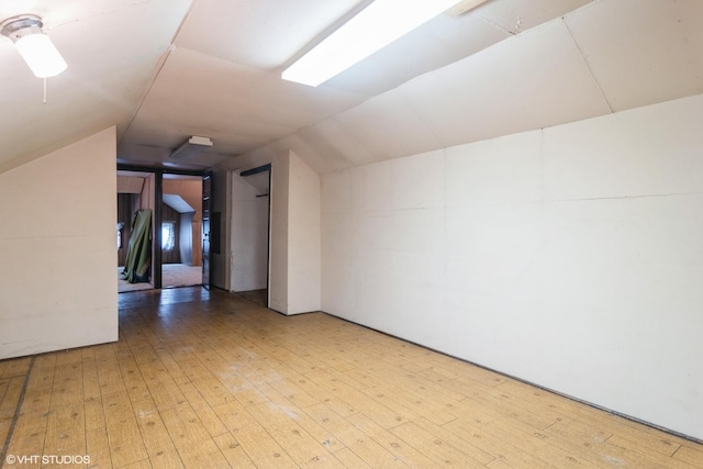 6919 N Overhill Ave, Chicago, IL 60631 - spare room with wood finished floors and vaulted ceiling
