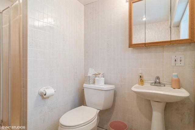 6919 N Overhill Ave, Chicago, IL 60631 - full bathroom featuring tile walls and a shower stall